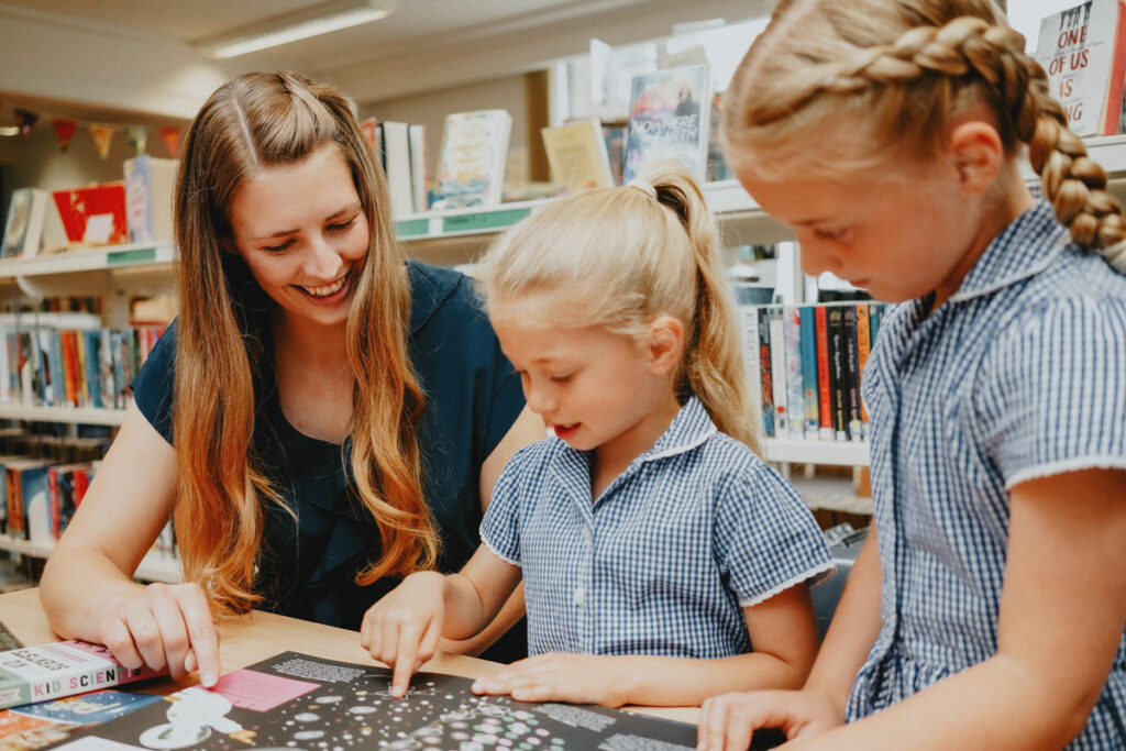 Trainee teacher working at school